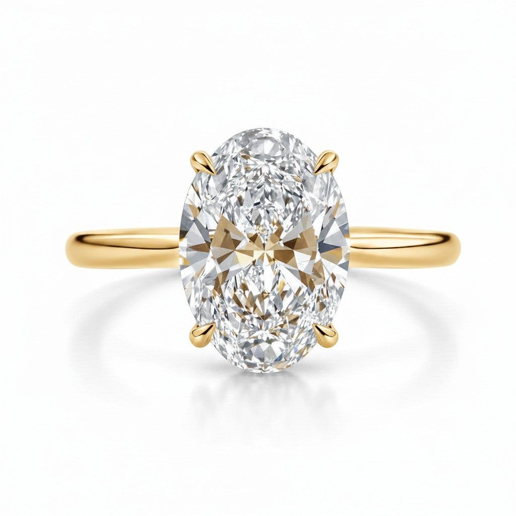 My Store 4 oval cut solitaire engagement ring with a brilliant center stone on a polished yellow gold band