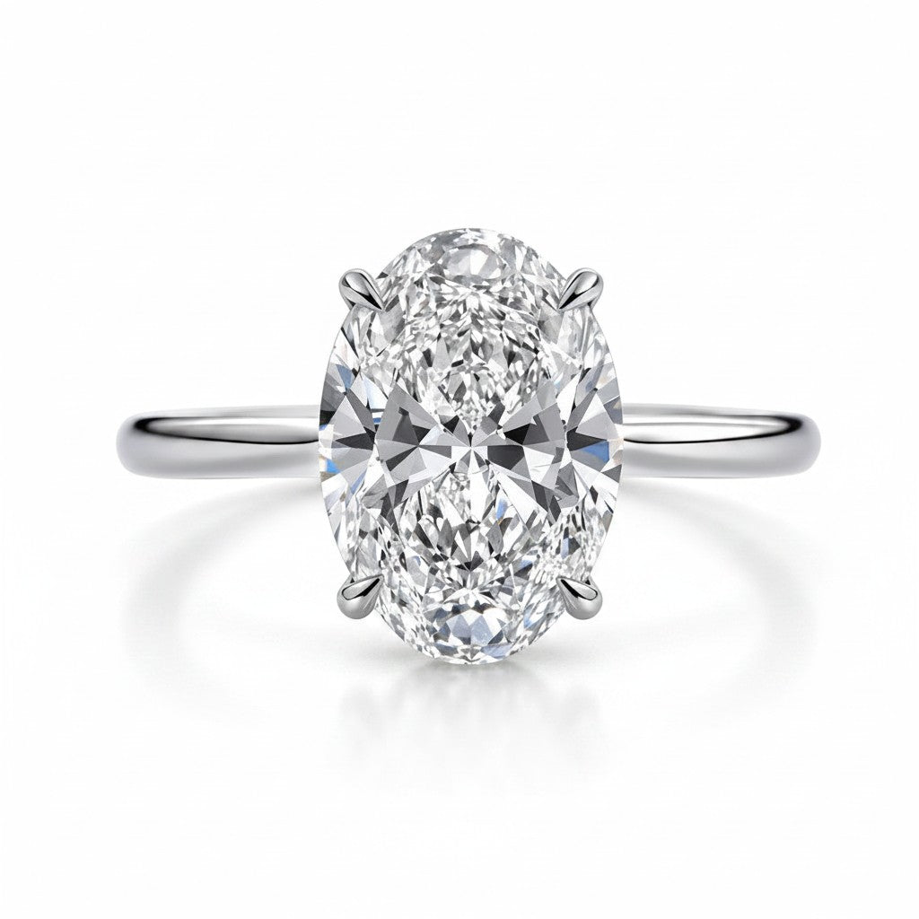 My Store 4 oval cut solitaire engagement ring with double-claw prongs on a polished white gold band.