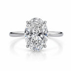 My Store 4 oval cut solitaire engagement ring with double-claw prongs on a polished white gold band.
