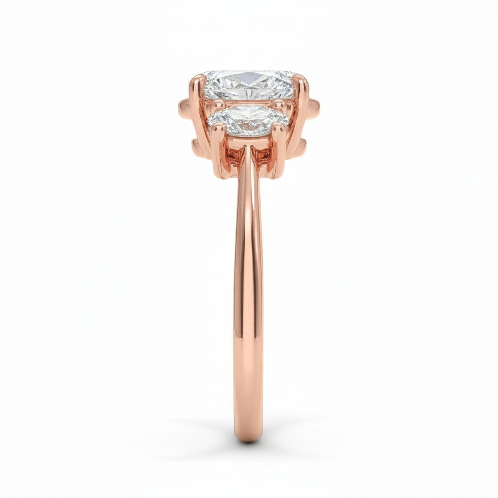 My Store 4 18K solid gold trilogy engagement ring featuring an oval lab-grown diamond with oval side stones, side view.