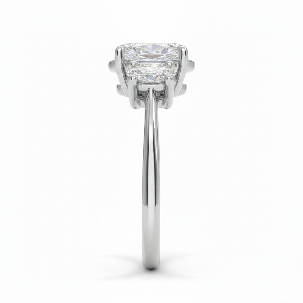 My Store 4 18K solid gold trilogy engagement ring with three oval-cut lab-grown diamonds in a side profile view.
