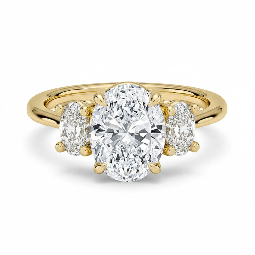 My Store 4 18K solid gold trilogy engagement ring featuring a large oval lab-grown diamond with oval side stones.