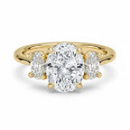 My Store 4 18K solid gold trilogy engagement ring featuring a large oval lab-grown diamond with oval side stones.