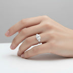 My Store 4 18K solid gold trilogy engagement ring featuring a central oval lab-grown diamond with oval side stones.