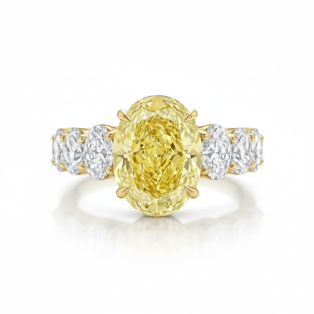 My Store 4 18K solid gold engagement ring featuring a large oval fancy yellow lab diamond with side accent stones.