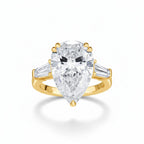 My Store 4 pear cut engagement ring with tapered baguette side diamonds in polished yellow gold
