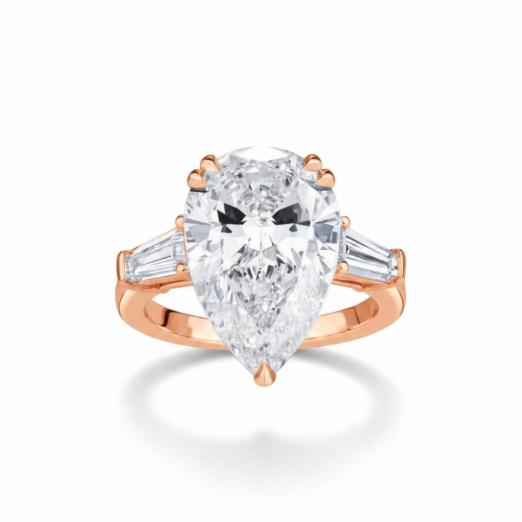 My Store 4 pear cut engagement ring with tapered baguette side diamonds set in polished rose gold
