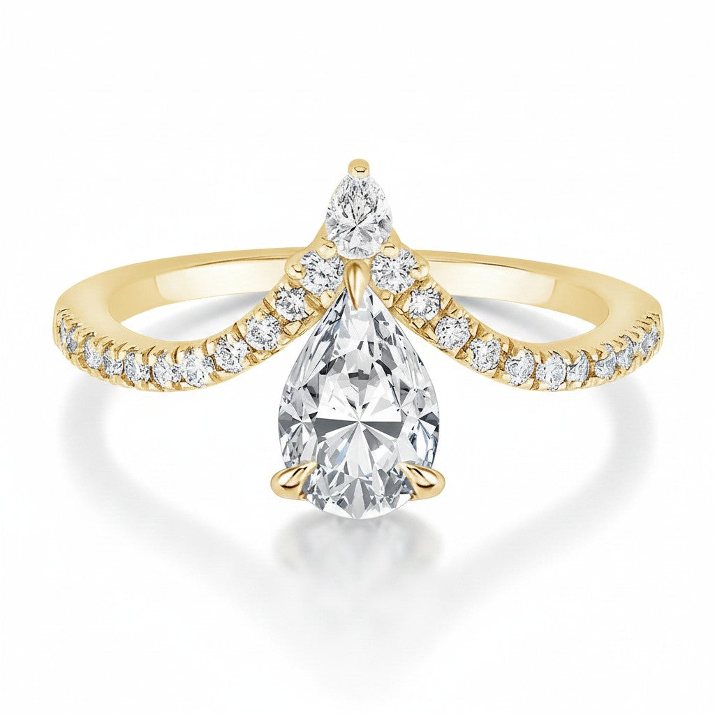 My Store 4 pear cut chevron pavé engagement ring in 18K yellow gold with a teardrop diamond and crown silhouette.