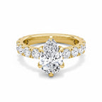 My Store 4 pear cut diamond engagement ring with a five-prong setting and shared-prong accent band in yellow gold.