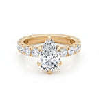 My Store 4 pear cut diamond engagement ring in 18K yellow gold with a shared-prong accent band and five-prong setting.