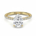 My Store 4 pear cut diamond engagement ring with a pavé band and hidden halo in 18K yellow gold