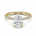 My Store 4 pear cut diamond engagement ring with a pavé band and hidden halo in 18K yellow gold