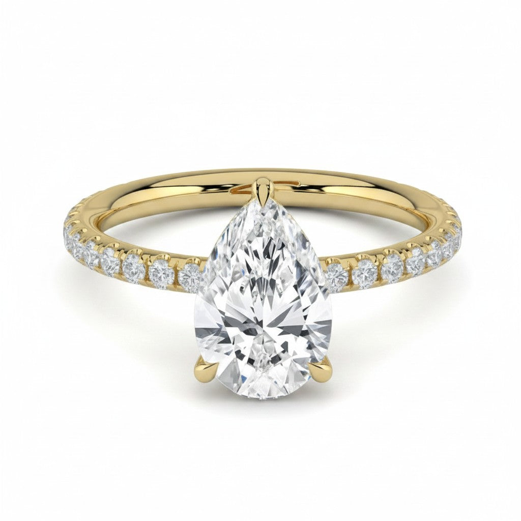 My Store 4 pear cut diamond engagement ring with a pavé band and hidden halo in 18K yellow gold
