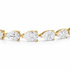 My Store 4 pear cut diamond tennis bracelet featuring brilliant teardrop stones set in polished yellow gold.