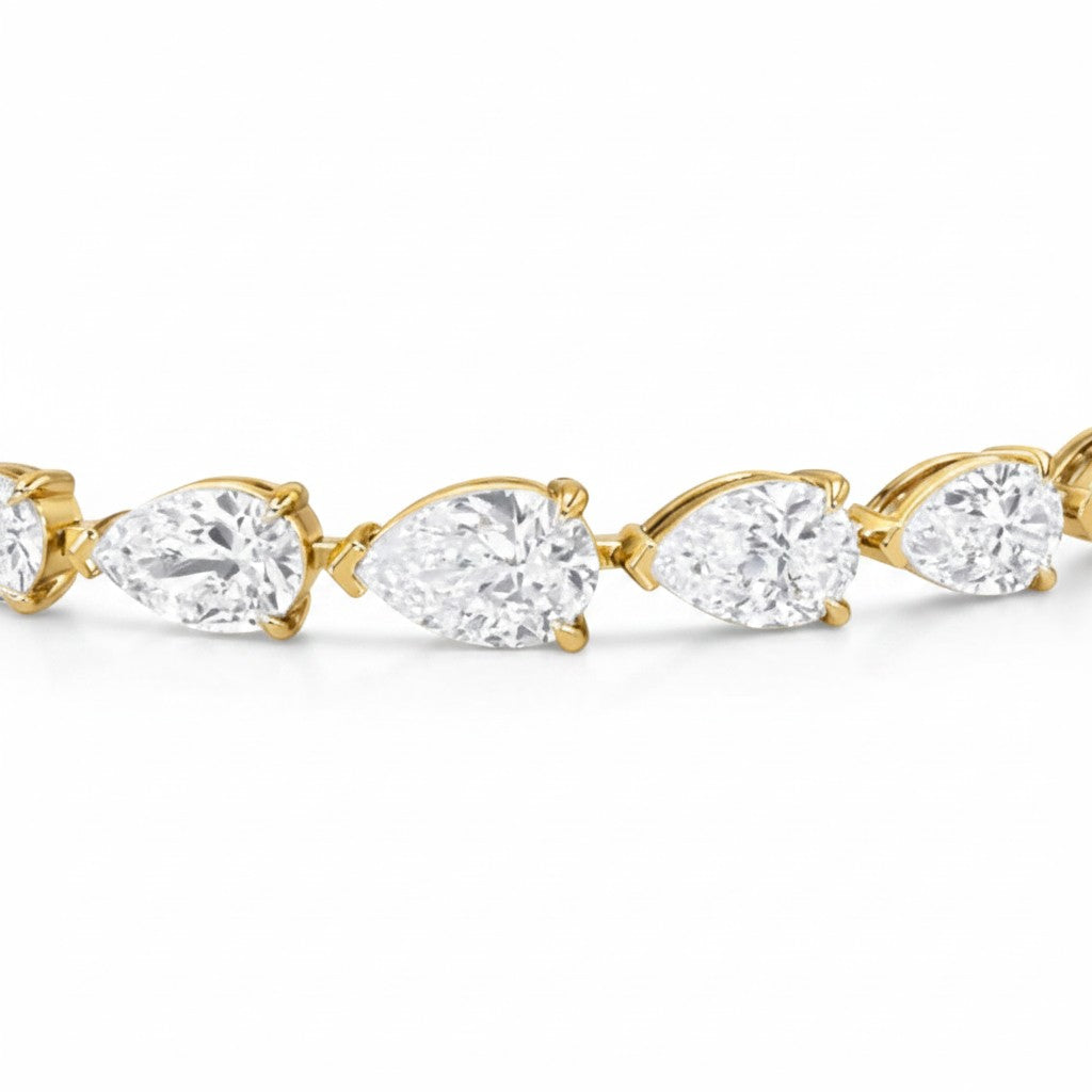 My Store 4 pear cut diamond tennis bracelet featuring brilliant teardrop stones set in polished yellow gold.
