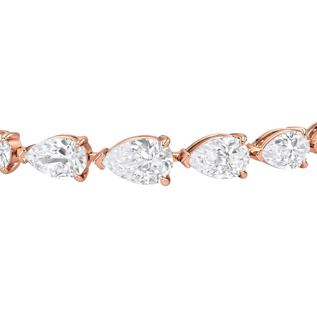 My Store 4 rose gold tennis bracelet featuring a continuous line of brilliant pear-cut diamonds in a prong setting.