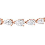 My Store 4 rose gold tennis bracelet featuring a continuous line of brilliant pear-cut diamonds in a prong setting.