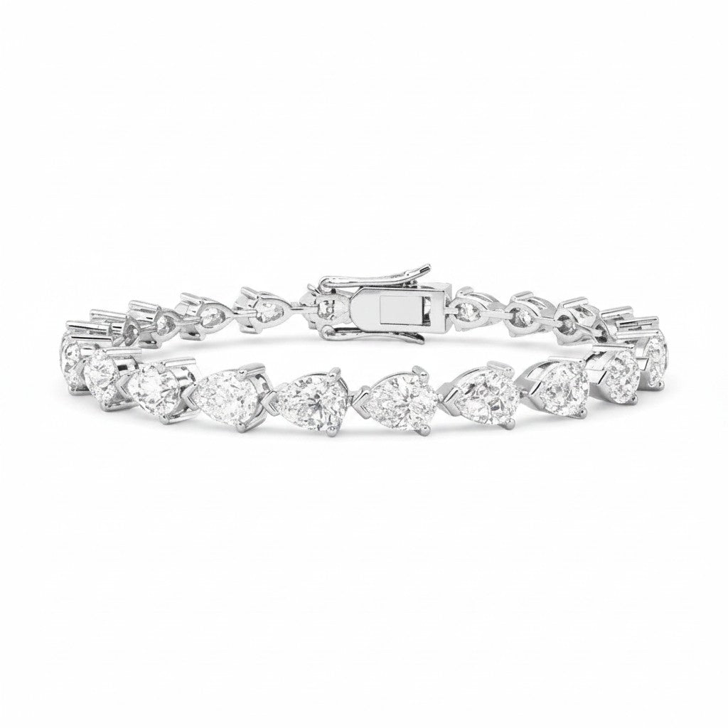 My Store 4 pear cut diamond tennis bracelet in white gold with a secure box clasp and brilliant faceted stones.