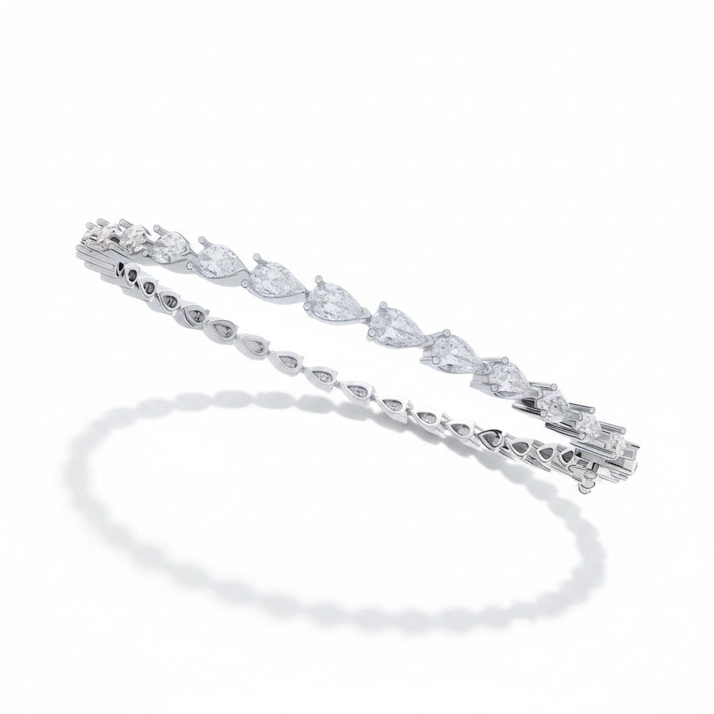 My Store 4 pear cut diamond tennis bracelet in white gold with a secure box clasp and dual safety catches.
