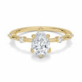 My Store 4 pear cut engagement ring in 18K yellow gold with a station accent band and five-prong setting