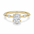 My Store 4 pear cut engagement ring in 18K yellow gold with a station accent band and five-prong setting