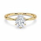 My Store 4 pear cut solitaire engagement ring featuring a brilliant teardrop diamond on a polished 18K yellow gold band.