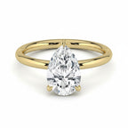 My Store 4 pear cut diamond solitaire engagement ring with a hidden halo on a polished 18k yellow gold band
