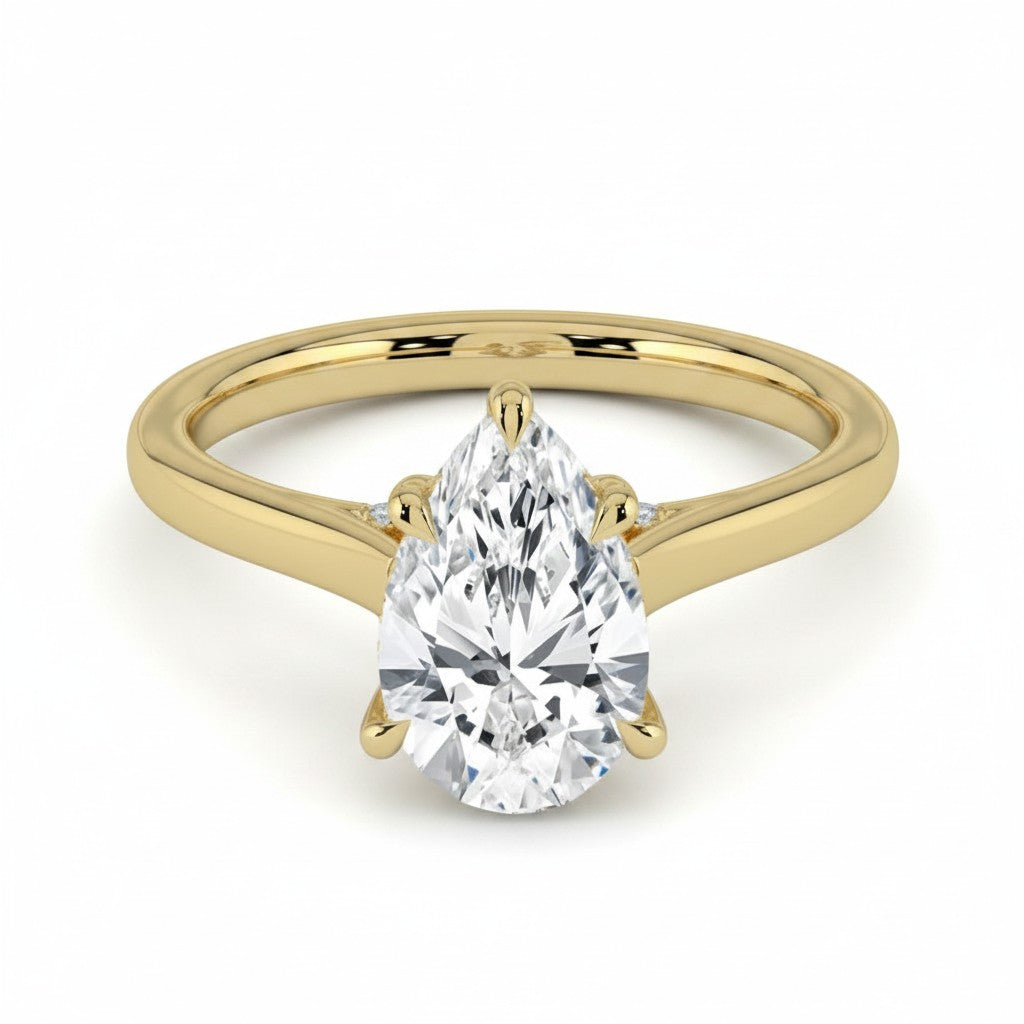 My Store 4 pear cut diamond engagement ring with a hidden halo and cathedral bridge in polished 18K yellow gold