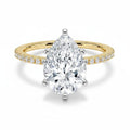 My Store 4 pear cut diamond engagement ring with a micro-pavé band and six-prong white gold setting in yellow gold.