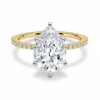 My Store 4 pear cut diamond engagement ring with a micro-pavé band and six-prong white gold setting in yellow gold.