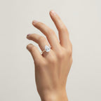 My Store 4 pear cut engagement ring with a micro-pavé band and six-prong setting on a woman's hand.