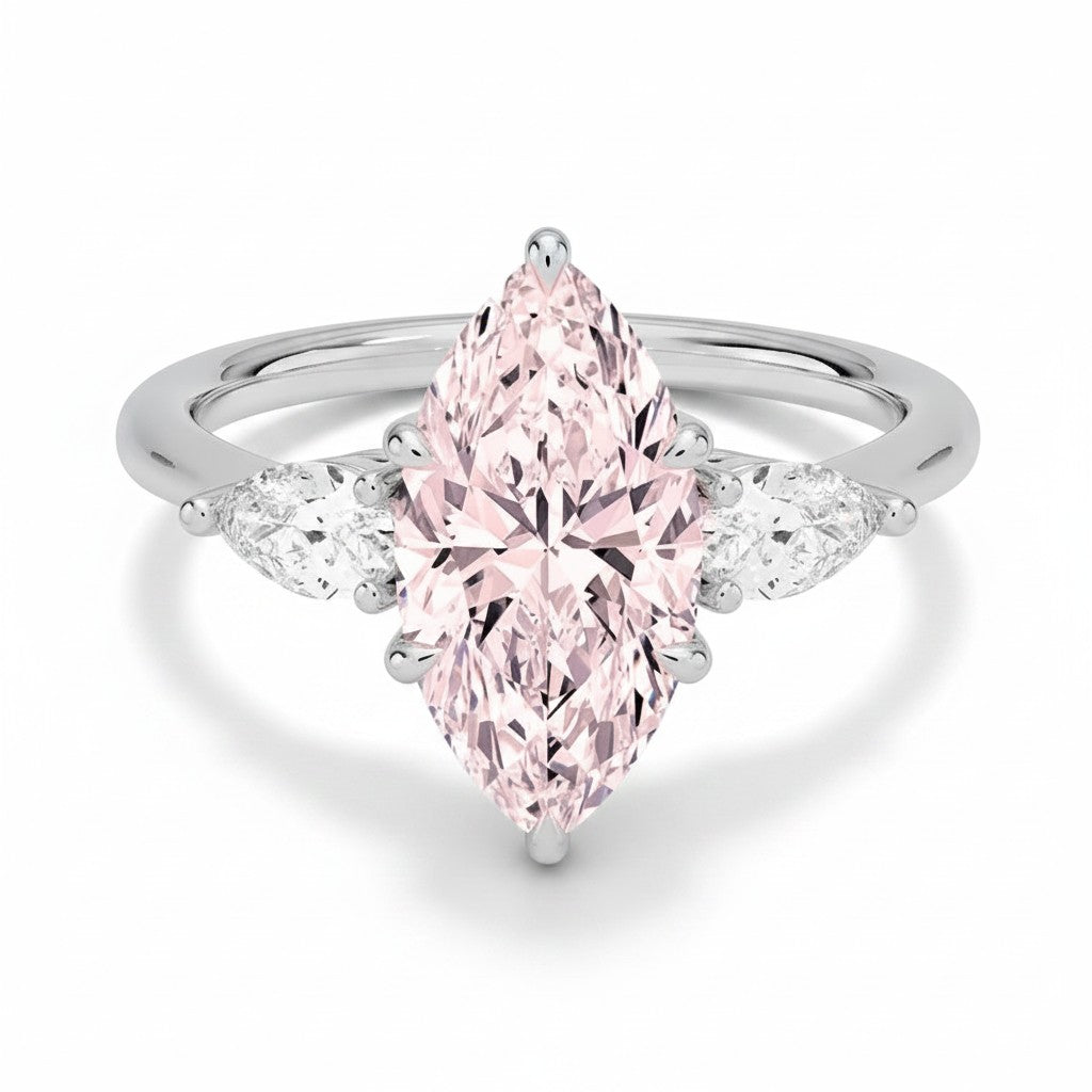 My Store 4 18K solid gold three-stone engagement ring featuring a large pear-cut pink lab-grown diamond centerpiece.
