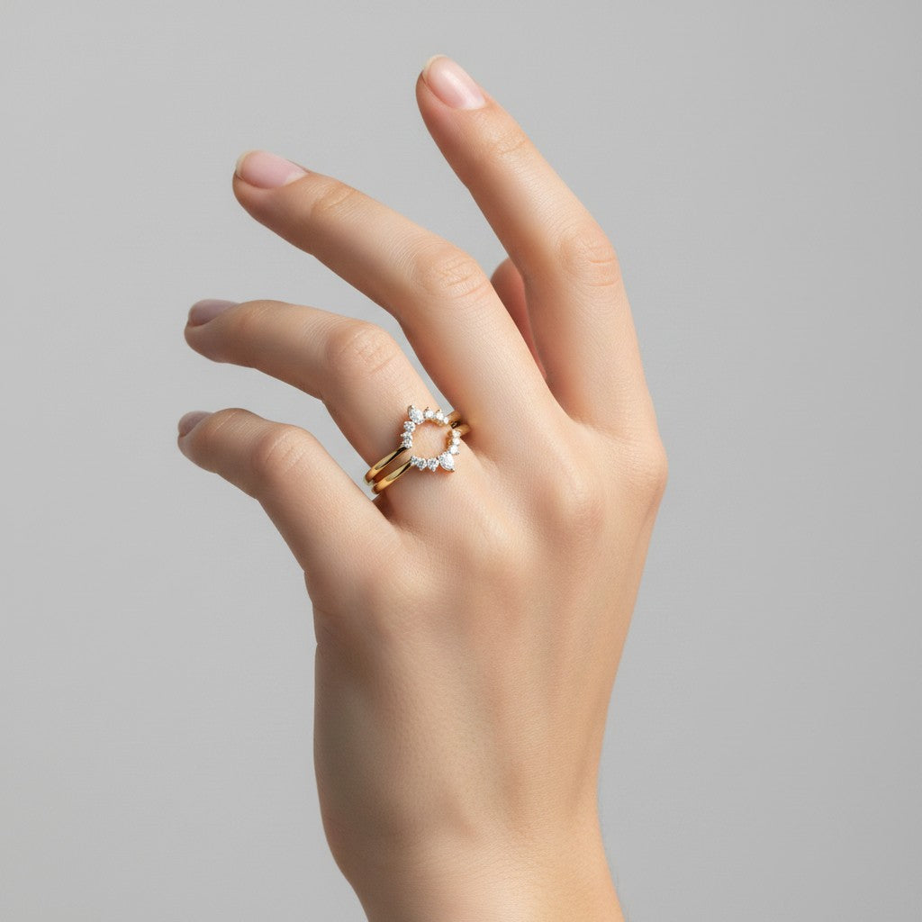 My Store 4 pear cut tiara diamond ring enhancer in solid yellow gold worn on a hand to frame a solitaire ring