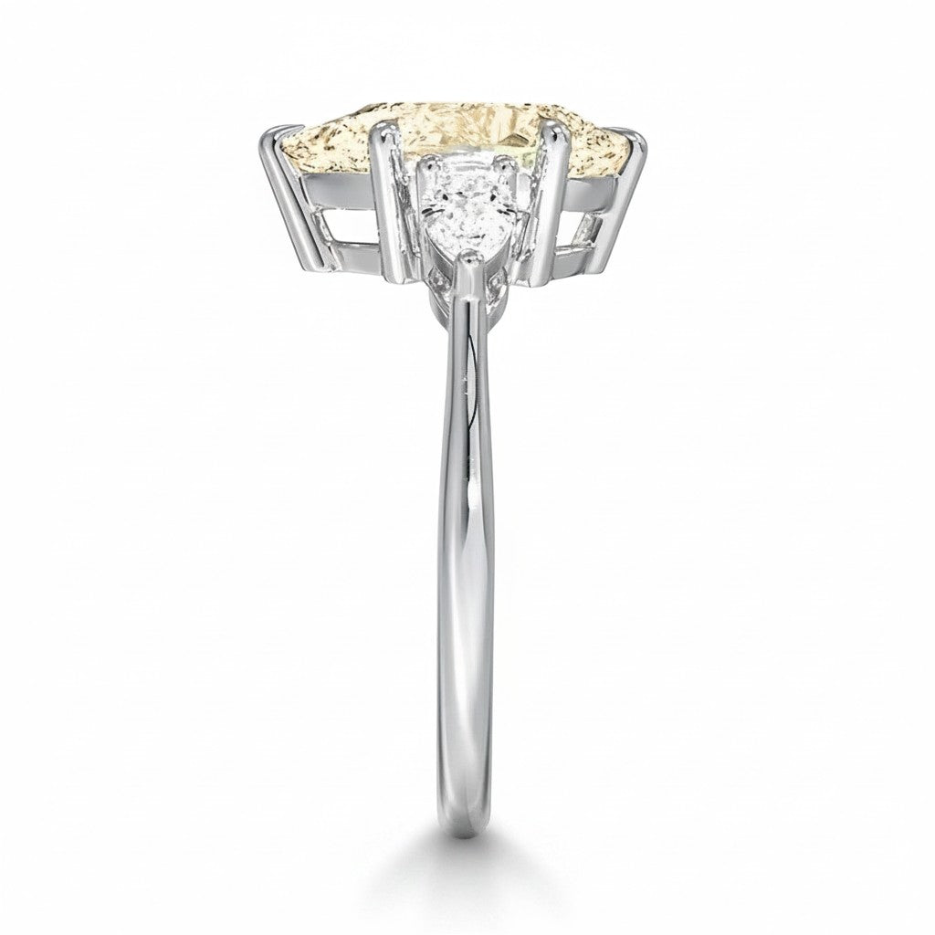 My Store 4 18K solid gold trilogy ring featuring a pear-cut fancy color lab-grown diamond with side stones