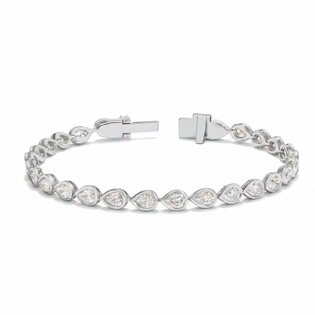 My Store 4 pear cut diamond tennis bracelet in white gold with a smooth protective bezel setting and box clasp.