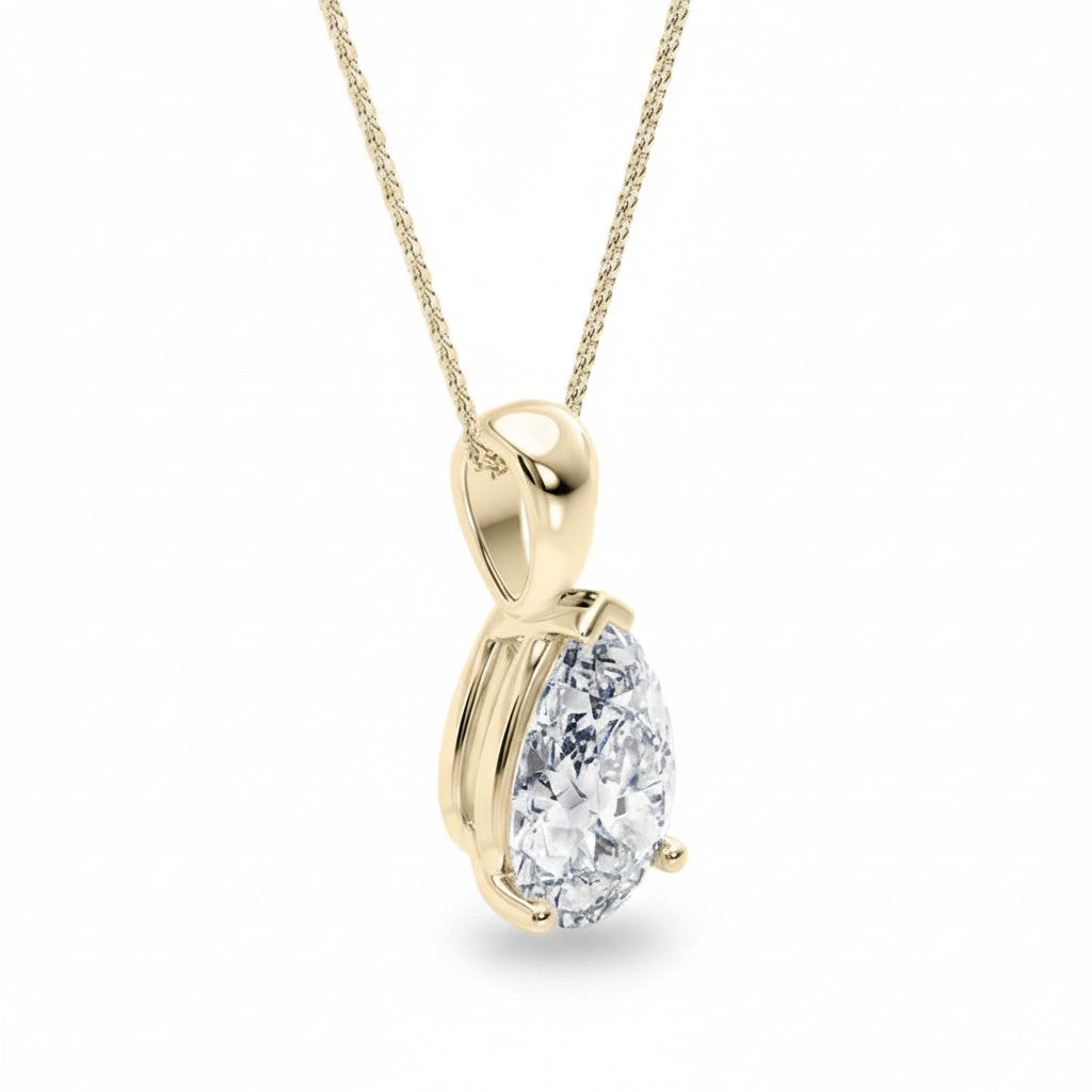 My Store 4 pear-cut diamond solitaire pendant necklace in 18K yellow gold with a tapered bail and V-prong setting.