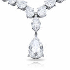 My Store 4 graduated pear diamond tennis necklace with a central teardrop pendant set in polished white gold.
