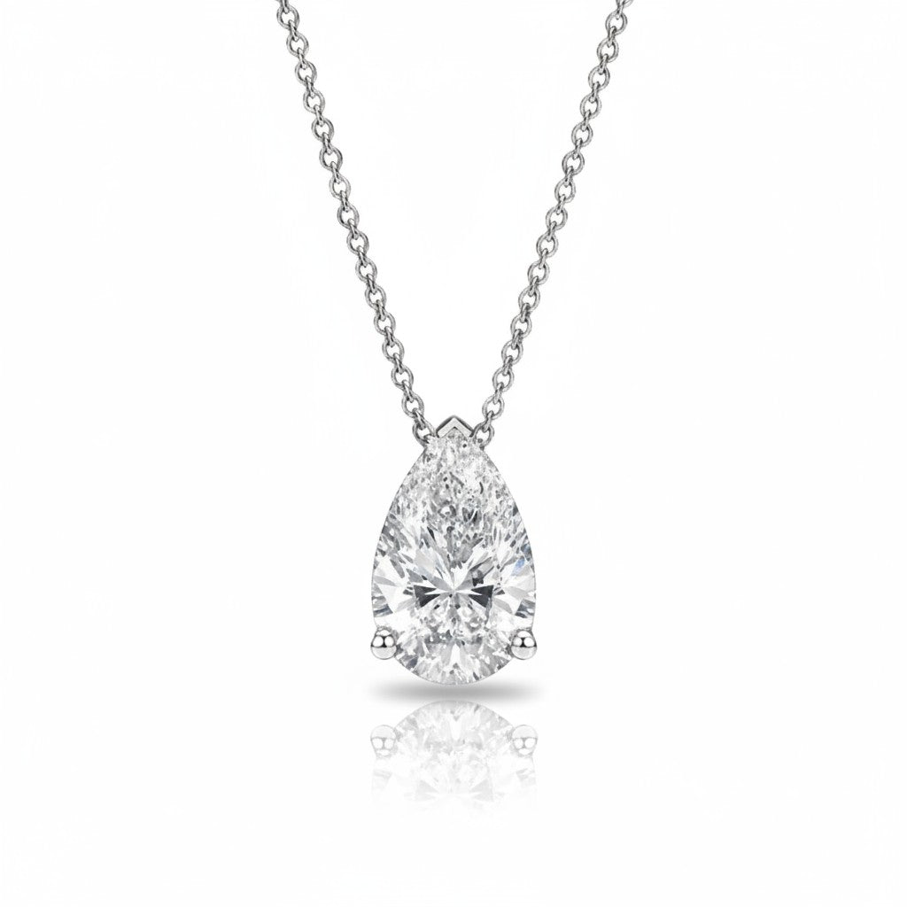 My Store 4 pear cut diamond solitaire pendant necklace on a delicate white gold cable chain with a floating design.
