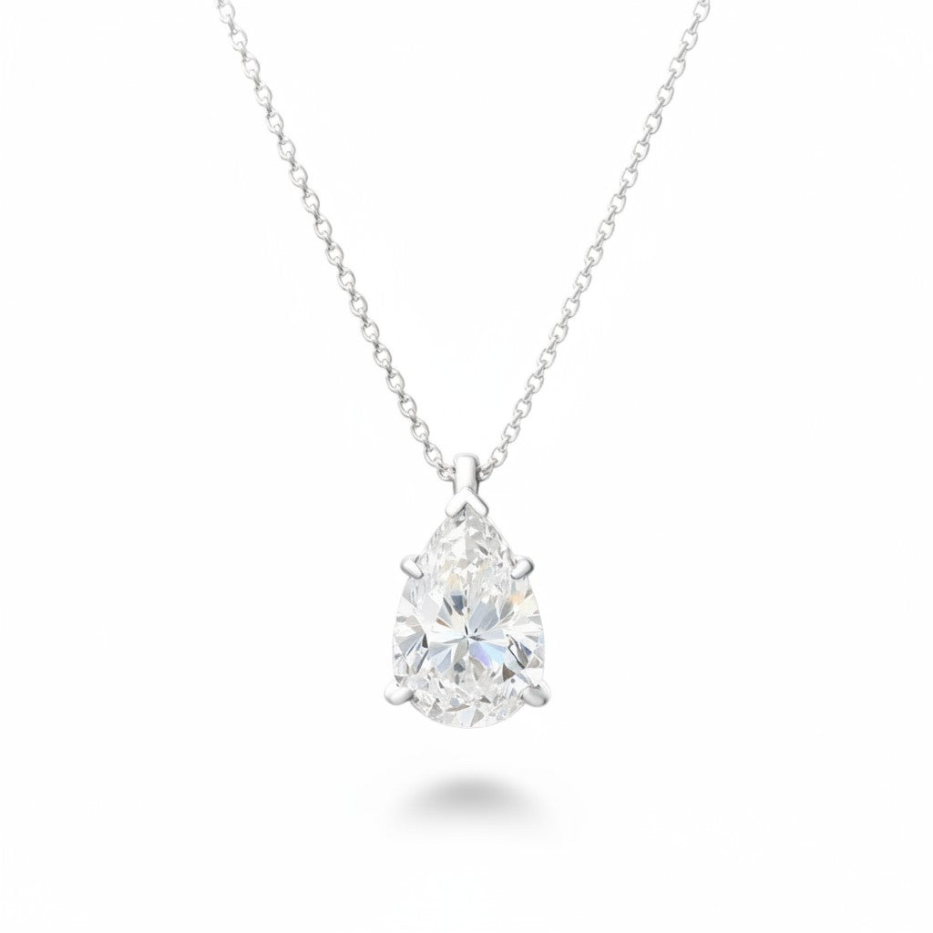 My Store 4 pear-cut diamond solitaire pendant on a delicate white gold chain against a clean white background