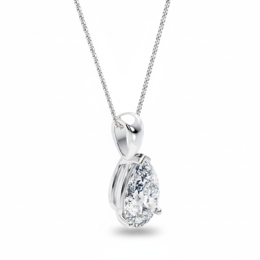 My Store 4 pear-cut diamond solitaire pendant in white gold with a tapered bail and fine cable chain