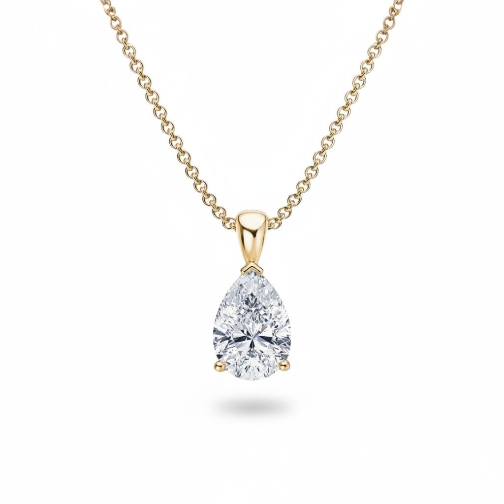 My Store 4 pear-cut diamond solitaire pendant necklace in 18K yellow gold with a tapered bail and fine cable chain.