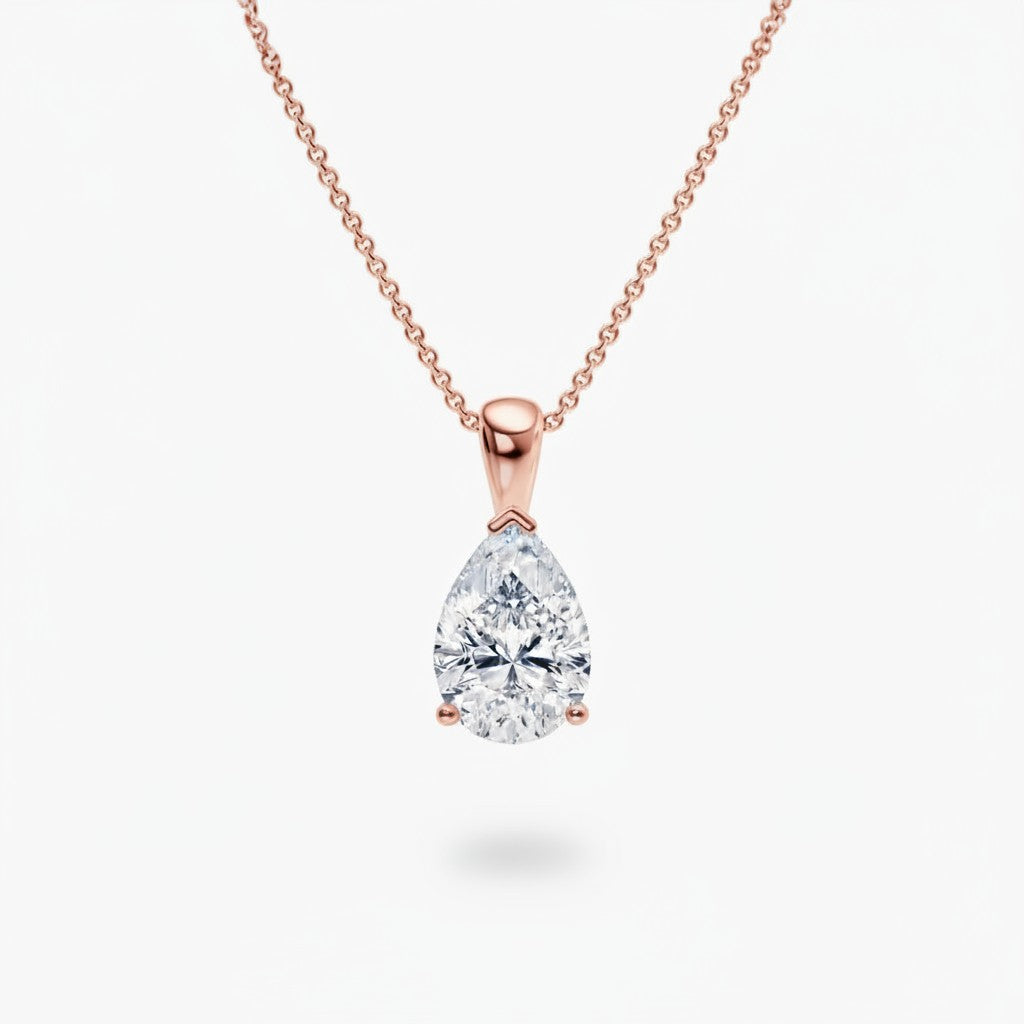 My Store 4 pear-cut diamond solitaire pendant necklace in rose gold with a tapered bail on a delicate cable chain.