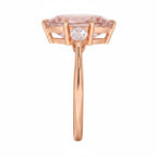 My Store 4 18K solid gold three-stone engagement ring featuring a pear-cut lab-grown diamond in a side profile view.