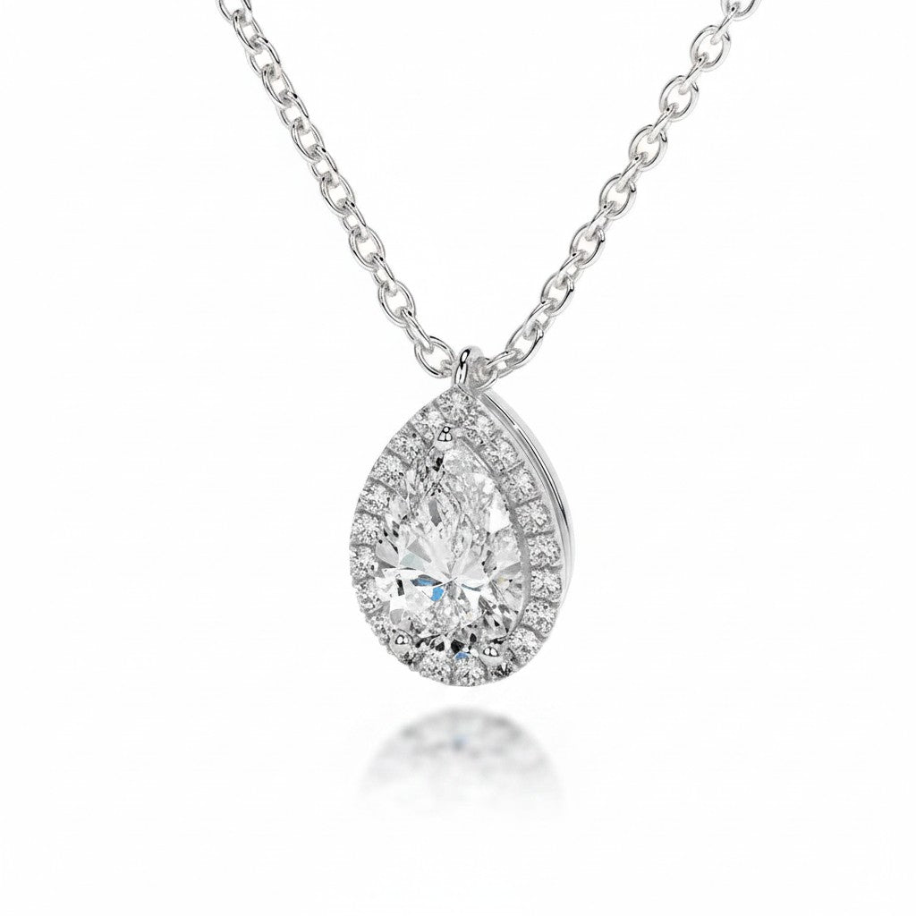 My Store 4 pear-cut diamond pendant with a micro-pave halo on a fine white gold chain, floating teardrop design.