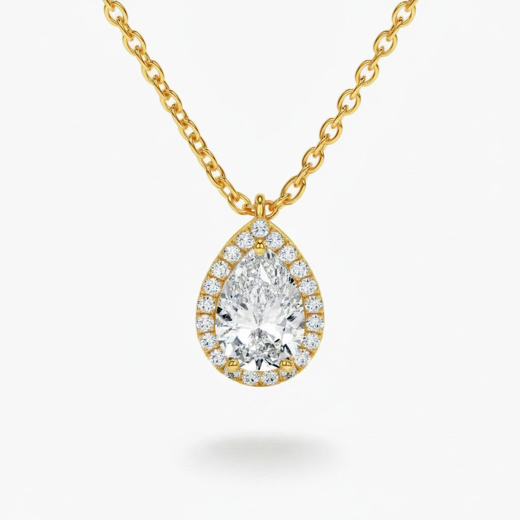 My Store 4 pear-cut diamond pendant necklace with a micro-pave halo on a delicate 18K yellow gold cable chain.