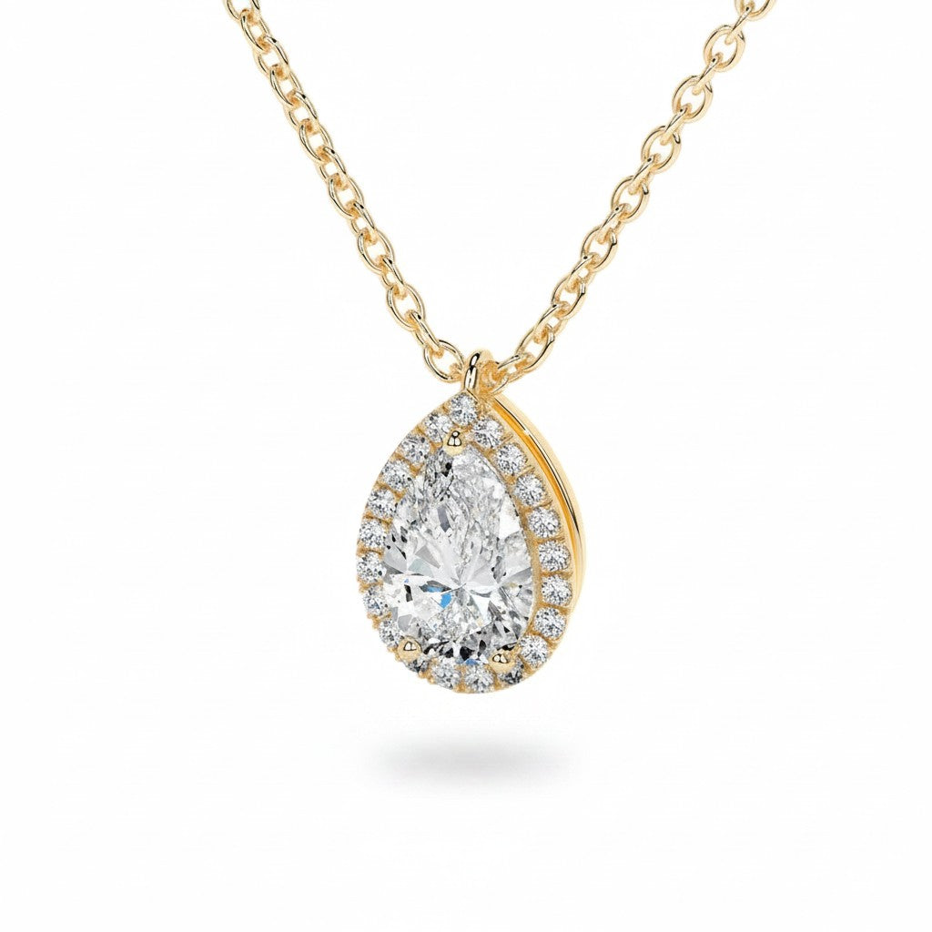 My Store 4 pear-cut diamond pendant necklace with a micro-pave halo on a delicate 18K yellow gold cable chain.