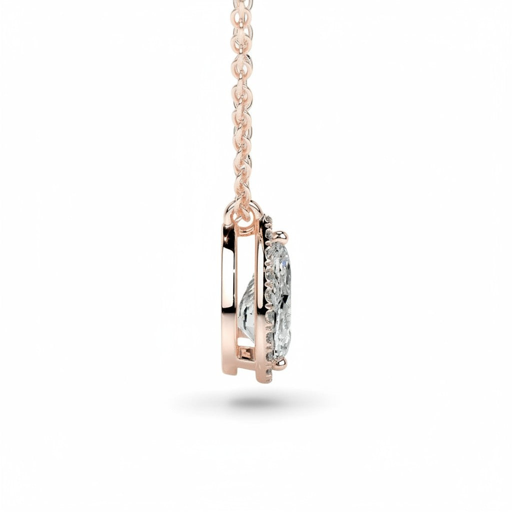 My Store 4 pear-cut diamond pendant with micro-pave halo in rose gold, featuring a bail-free floating design.