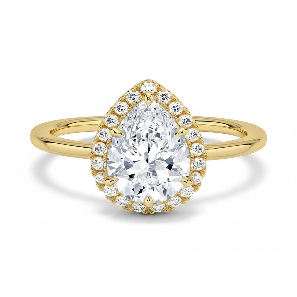 My Store 4 18K solid gold pear-shaped halo engagement ring with a 2ct lab-grown diamond on a white background.