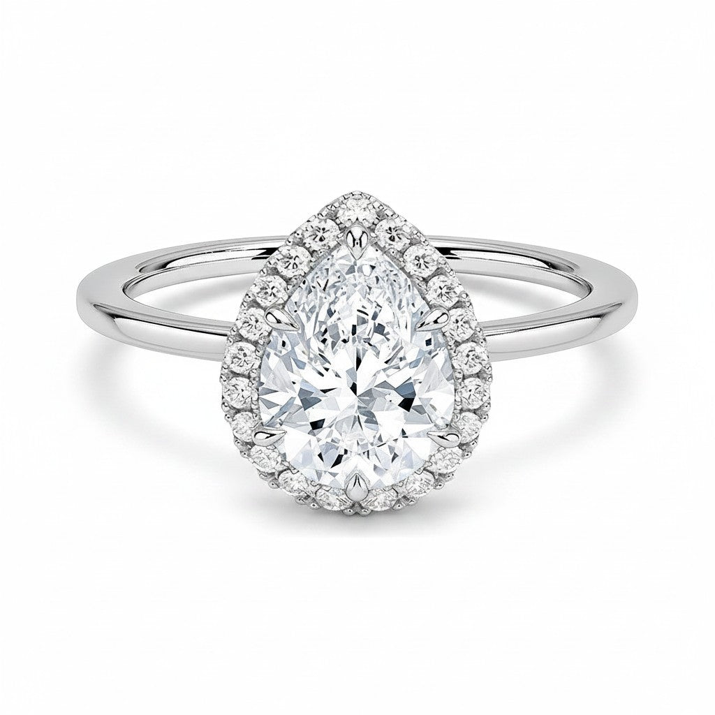 My Store 4 18K solid gold pear-shaped halo engagement ring featuring a brilliant lab-grown diamond