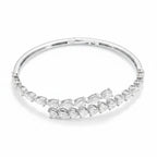 My Store 4 bypass open bangle bracelet featuring pear and heart cut diamonds set in polished white gold with a hinge.